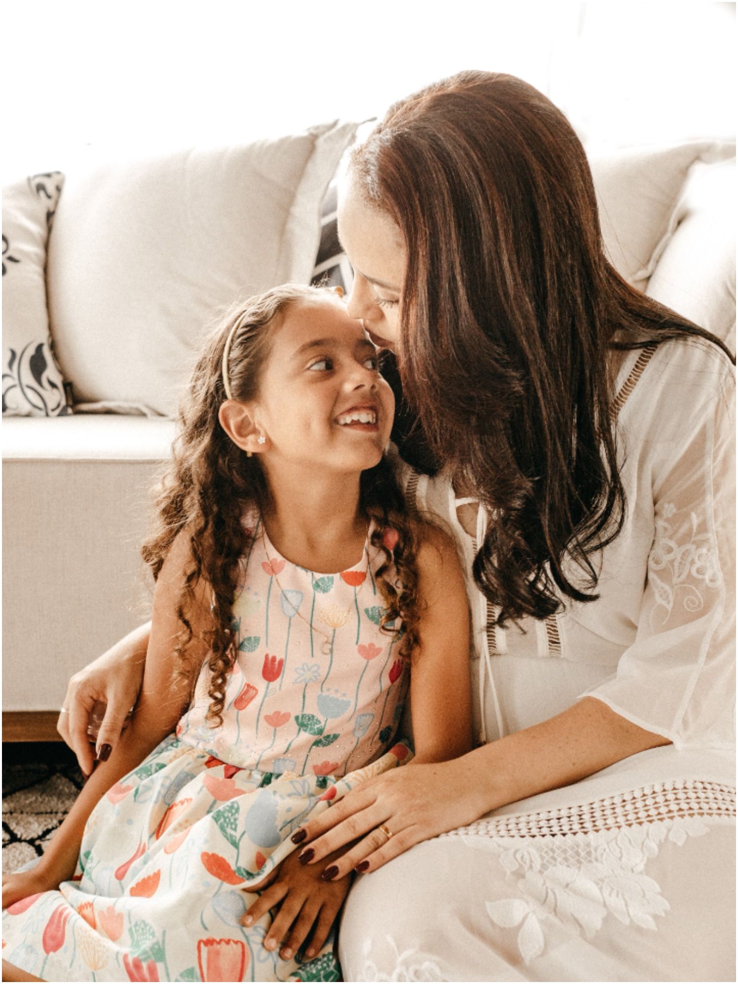 Mother-with-arm-around-daughter