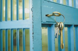 keys in a prison door lock, jail, opening it