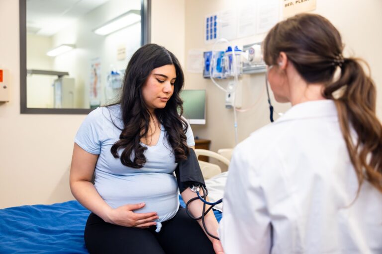 pregnant_woman_bloodpressure_cuff_nurse_clinic